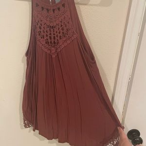 Charlotte Russe laced tank top. Previously loved. Cute and has a nice flow!